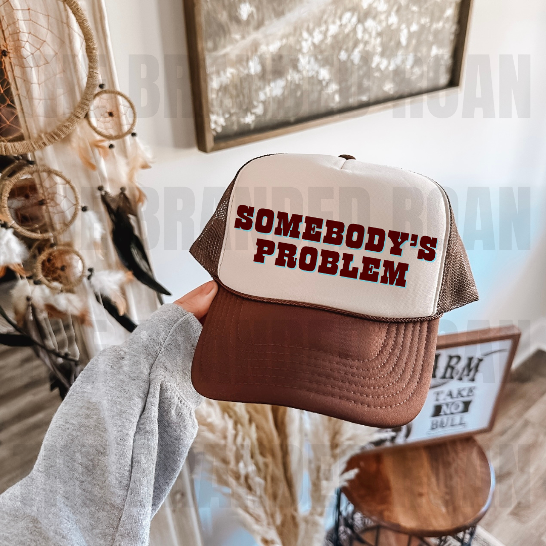 Somebody’s Problem Trucker Cap