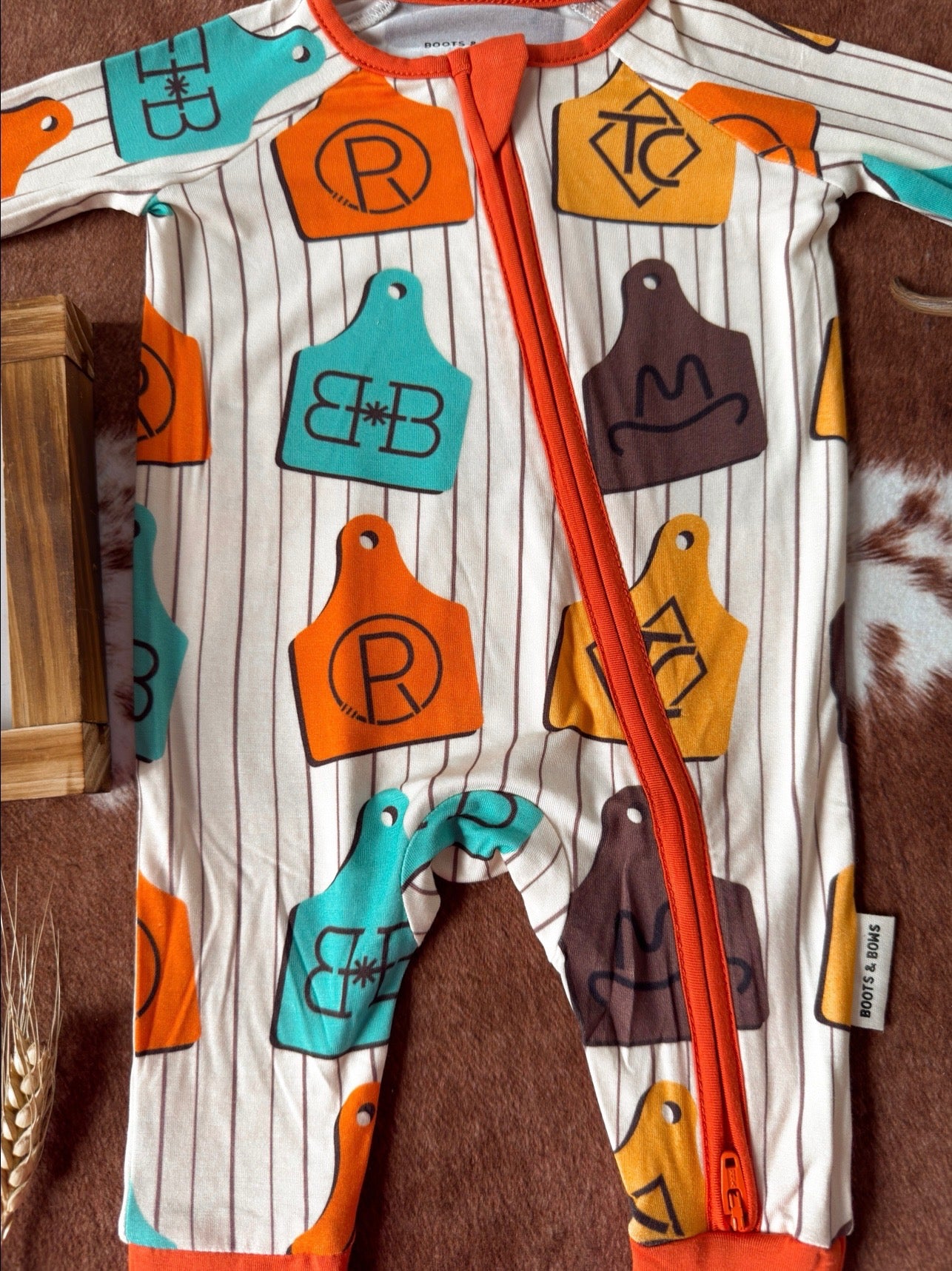 Cowtags Onesie