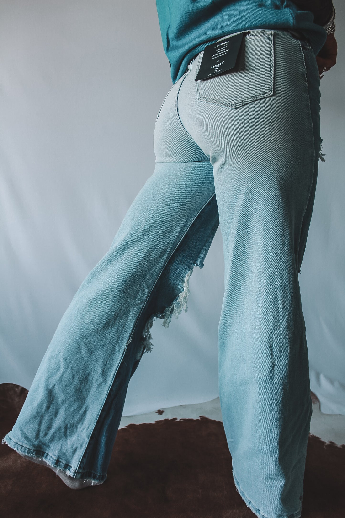 Light Wash High Rise Ripped Trousers
