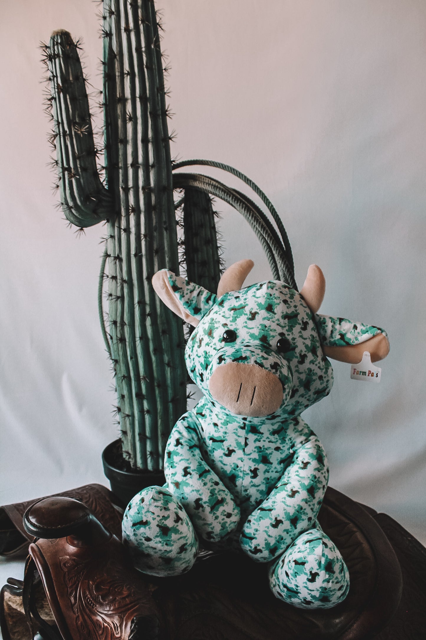 Turquoise & Brown Cow Print Farm Pal