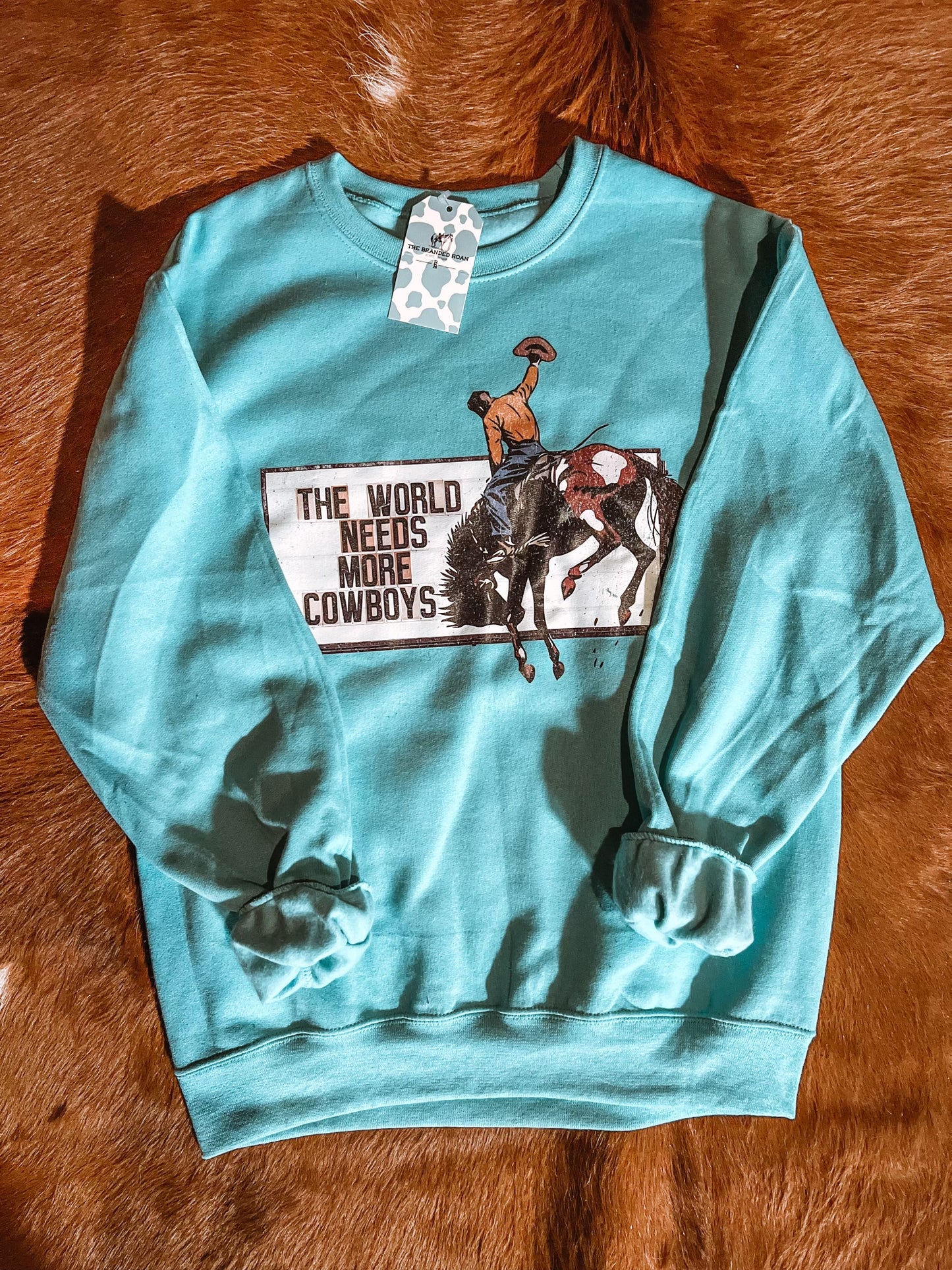 The Branded Roan - The World Needs More Cowboys Crewneck